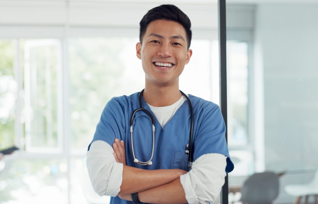 Asian male doctor smiling